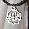Bahá’í necklace with symbolic calligraphy from Haifa