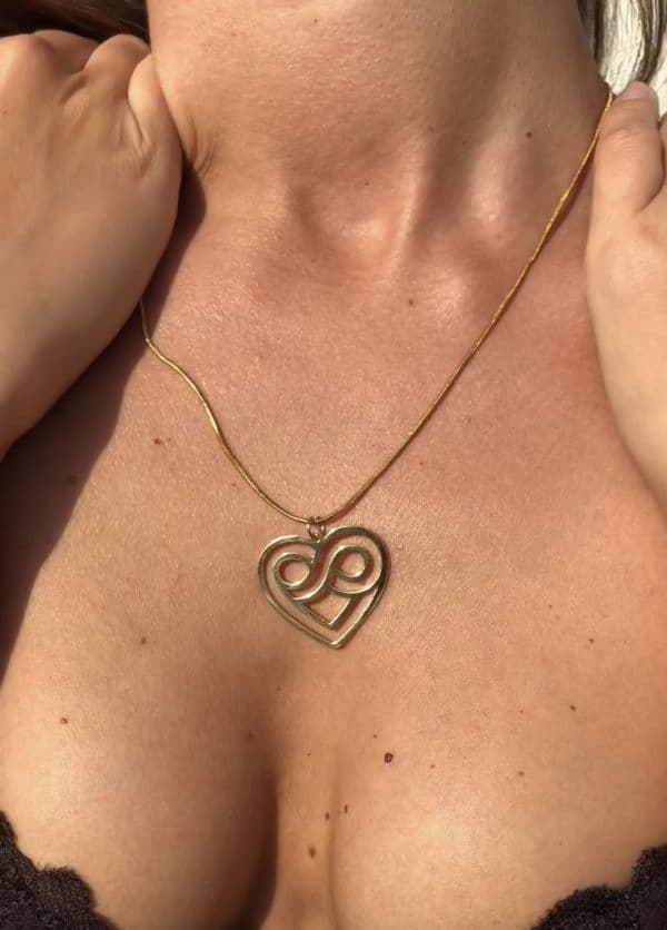 Infinity heart pendant necklace close-up