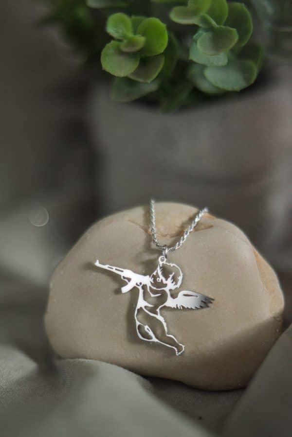Silver angel pendant with Kalashnikov