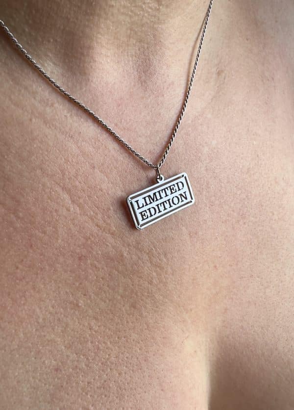 Limited Edition necklace laser cut pendant worn by woman