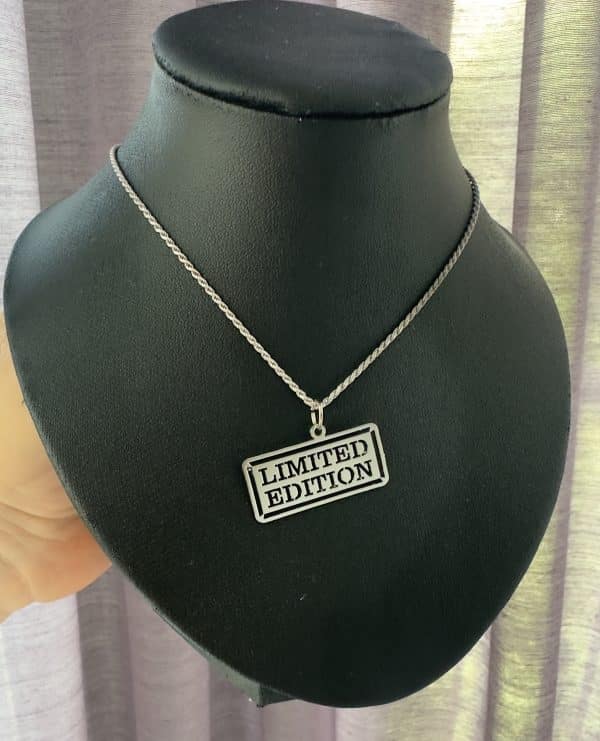 Limited Edition pendant necklace with laser cut lettering